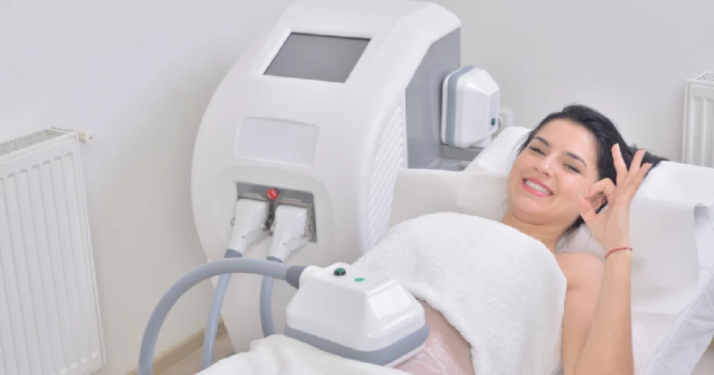 Current image: Women receiving a Coolsculpting treatment in Lexington, KY